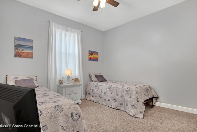 bedroom with ceiling fan and carpet floors