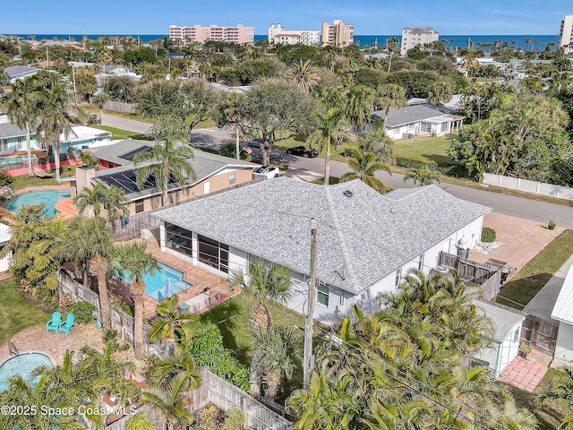 drone / aerial view with a water view