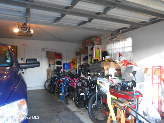 garage featuring a garage door opener