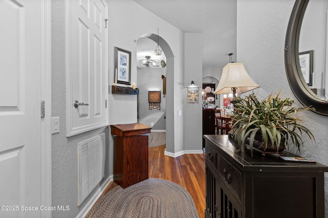 hall featuring dark hardwood / wood-style flooring