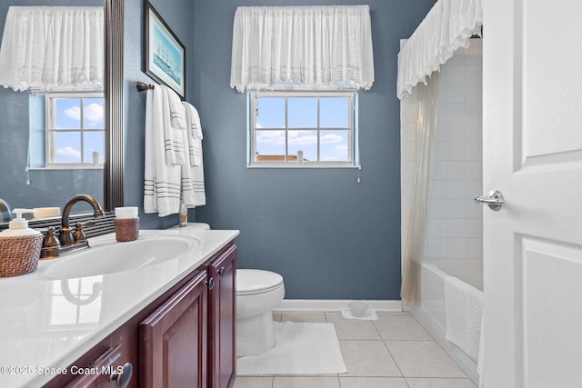 full bathroom with vanity, tile patterned flooring, a wealth of natural light, and toilet