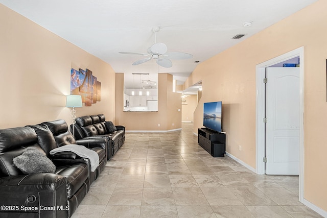 living room featuring ceiling fan