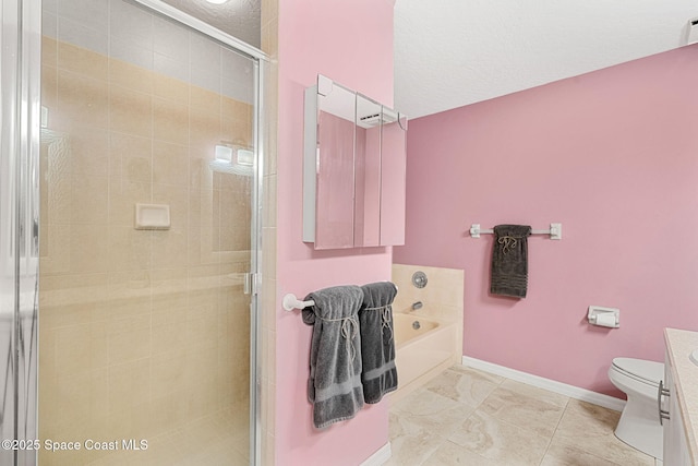 full bathroom featuring plus walk in shower, a textured ceiling, vanity, and toilet