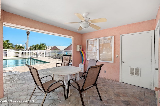 dining space with ceiling fan