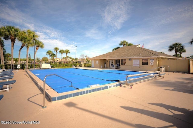 view of swimming pool featuring a patio area