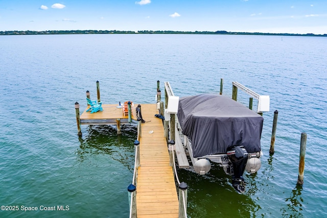 view of dock with a water view