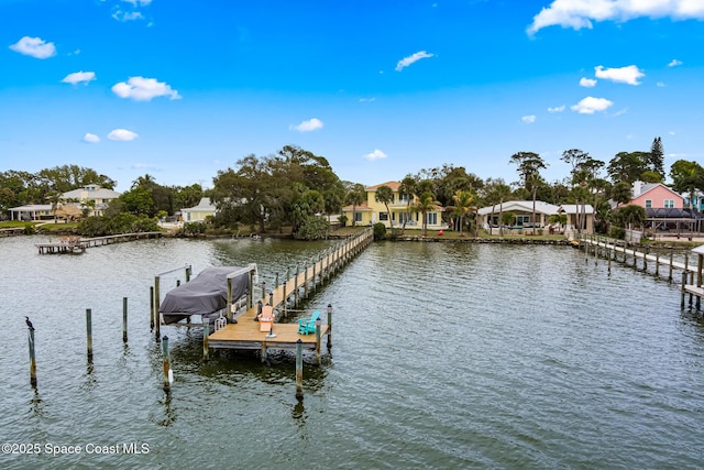 view of dock with a water view