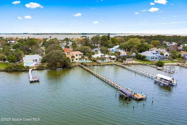 drone / aerial view with a water view