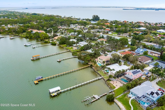 bird's eye view with a water view