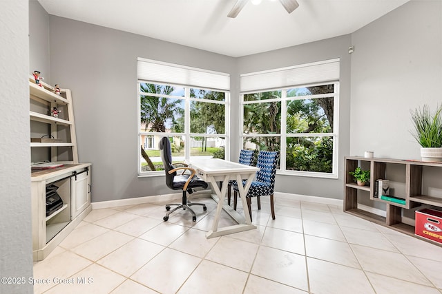 home office featuring plenty of natural light and light tile patterned floors