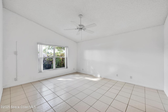 unfurnished room with ceiling fan, light tile patterned floors, a textured ceiling, and high vaulted ceiling