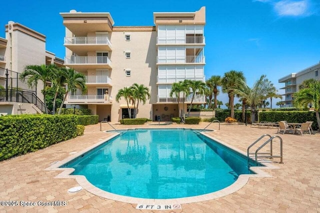 view of pool with a patio