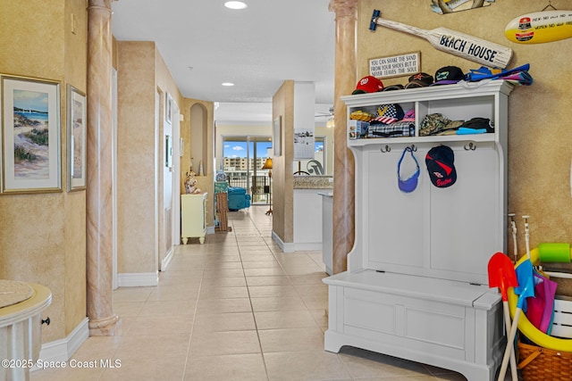 mudroom featuring light tile patterned floors