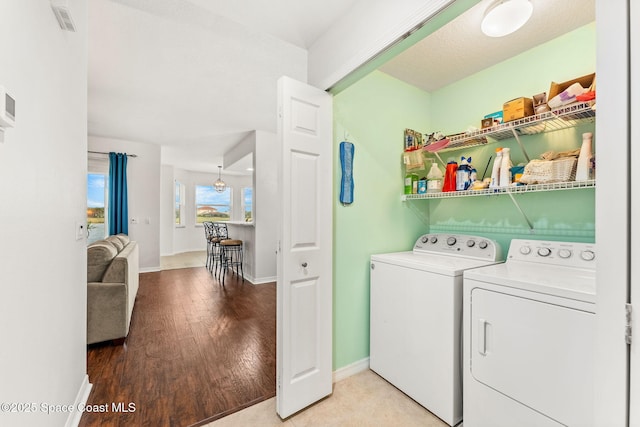 washroom featuring washer and dryer