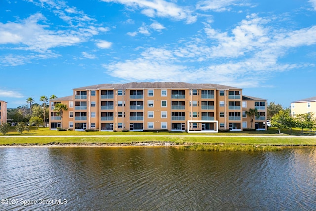 view of property with a water view