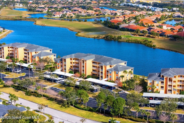 bird's eye view with a water view