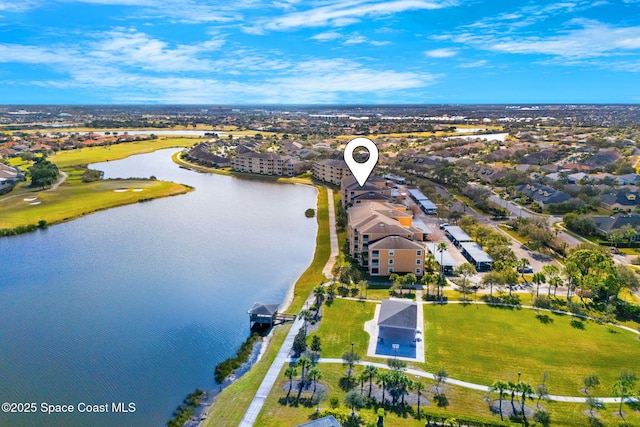 bird's eye view with a water view