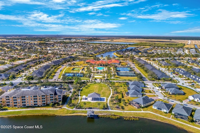 bird's eye view with a water view