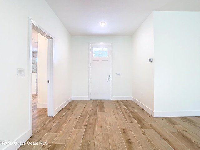 entrance foyer with light wood-type flooring