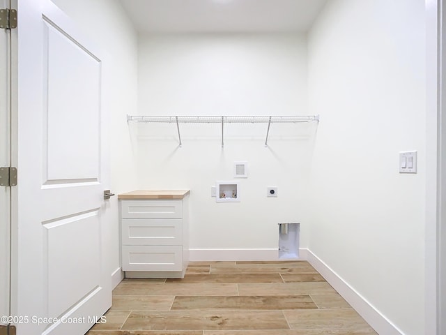 clothes washing area featuring washer hookup and hookup for an electric dryer