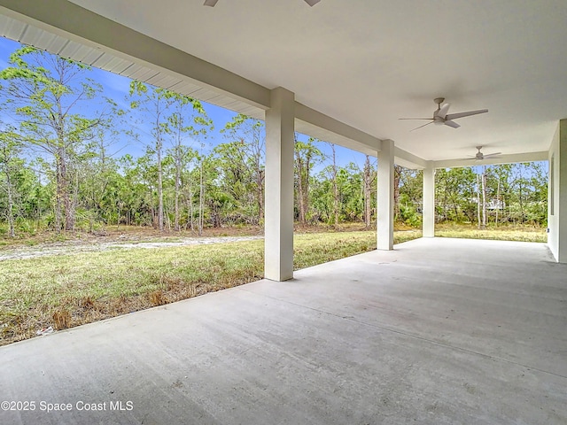 view of patio featuring ceiling fan