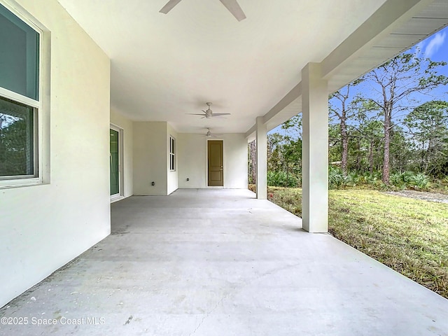 view of patio / terrace featuring ceiling fan