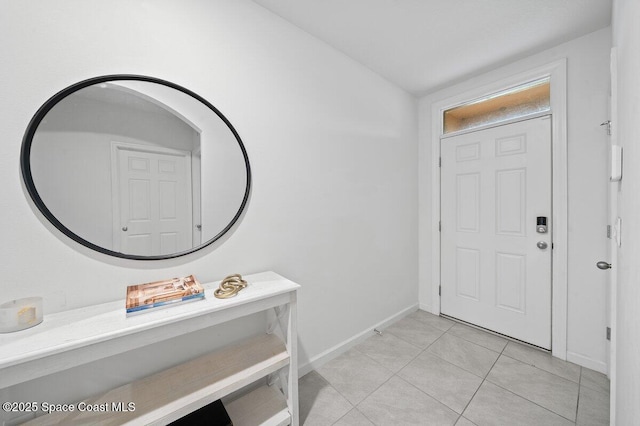 entrance foyer featuring light tile patterned flooring