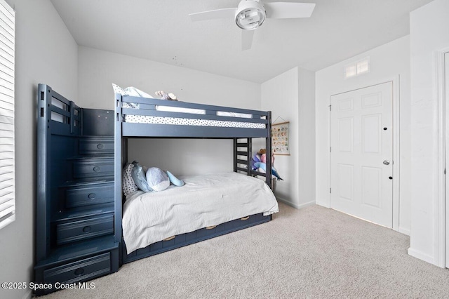 bedroom featuring carpet flooring and ceiling fan