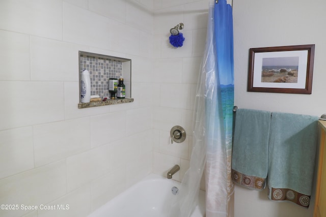 bathroom with shower / bath combo