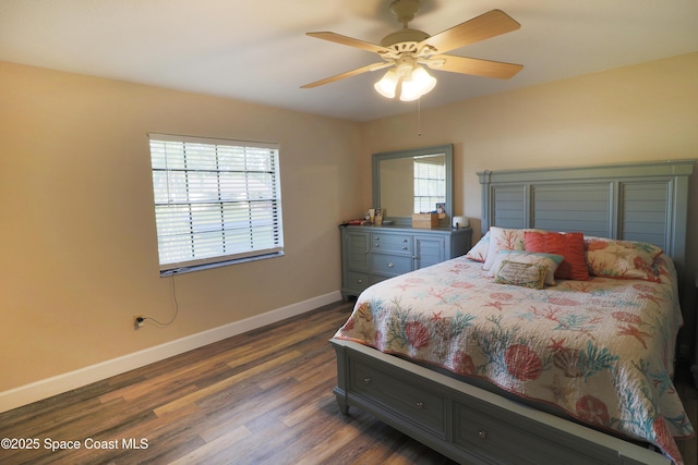 bedroom featuring ceiling fan and dark wood-type flooring