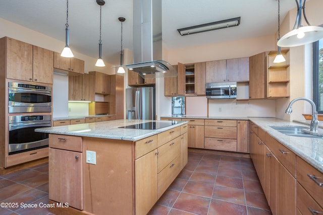 kitchen featuring a center island, decorative light fixtures, island exhaust hood, appliances with stainless steel finishes, and sink