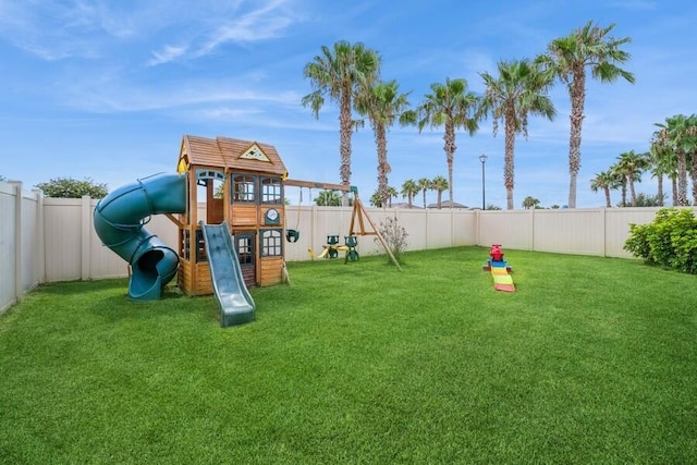 view of playground featuring a lawn