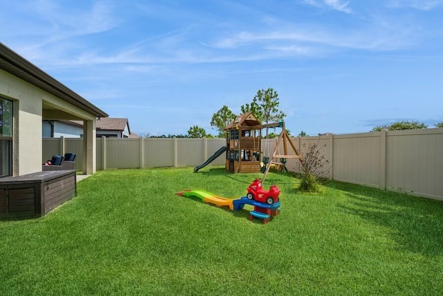 view of yard featuring a playground