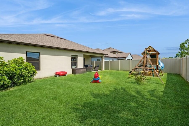 view of yard with a playground