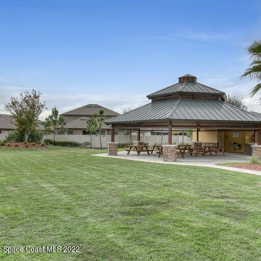 view of yard featuring a gazebo and a patio area