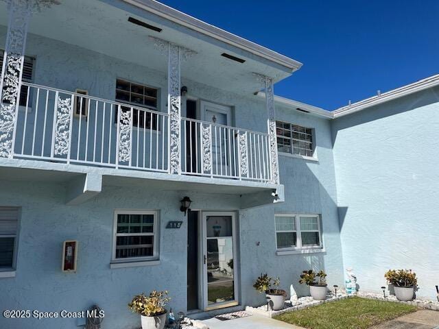 exterior space with a balcony