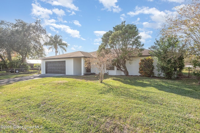 single story home with a front lawn and a garage