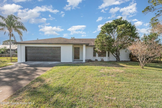 ranch-style home with a garage and a front yard