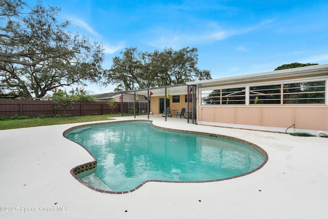 view of pool featuring a patio area