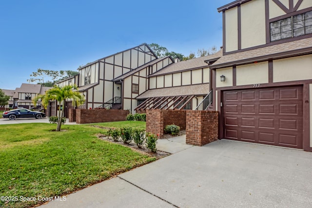 view of property exterior with a garage and a yard