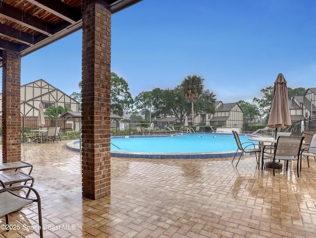 view of pool with a patio area