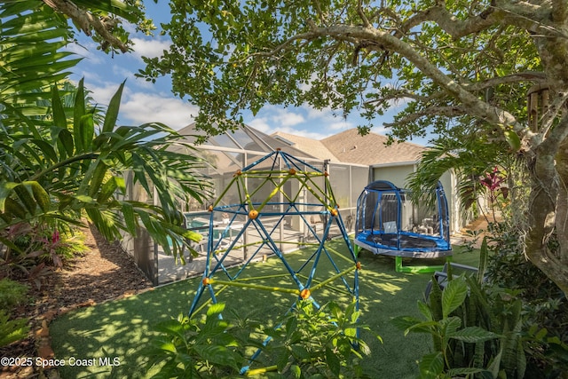 view of yard featuring a trampoline