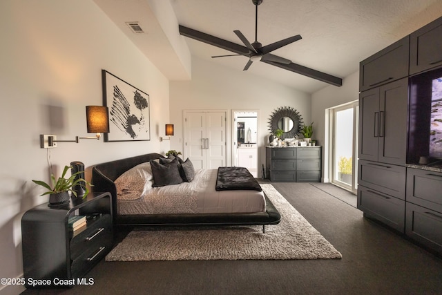 carpeted bedroom featuring ceiling fan, beam ceiling, and high vaulted ceiling