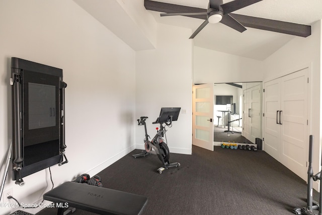 exercise room with ceiling fan and lofted ceiling