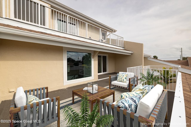 balcony featuring outdoor lounge area