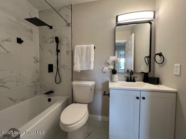 full bathroom with toilet, vanity, and tiled shower / bath combo