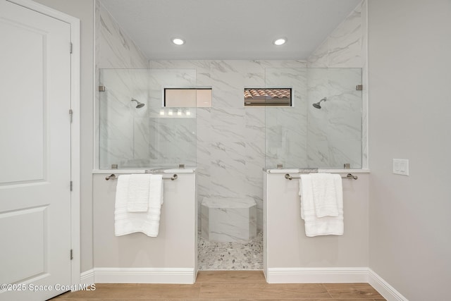 bathroom featuring tiled shower