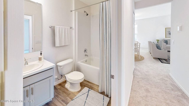 full bathroom with washtub / shower combination, vanity, and toilet