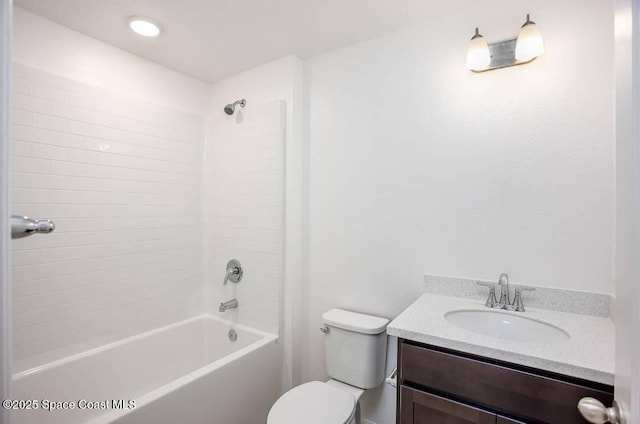 full bathroom featuring vanity, toilet, and washtub / shower combination