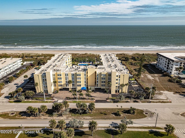 aerial view featuring a beach view and a water view